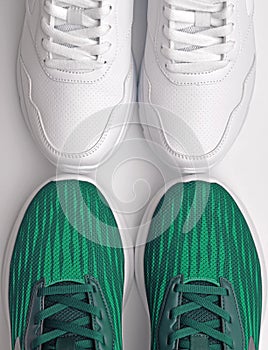 two pairs of sport shoes on a white background