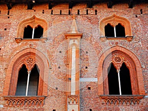 Two pairs of wonderful mullioned windows in the castle of Vigevano near Pavia in Lombardy (Italy) photo