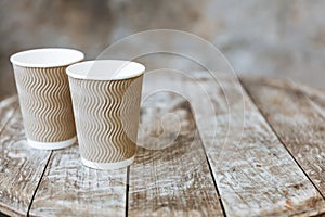 Two paper ribbed cups