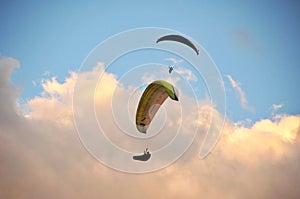 Two paragliders in the sky