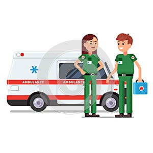 Two paramedics workers in front of ambulance car