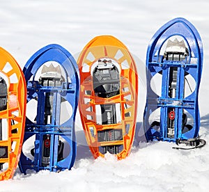 Two pari of modern snowshoes