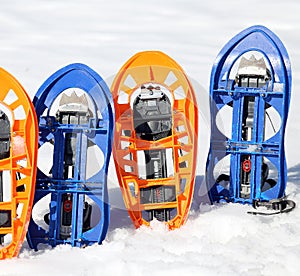 Two pari of modern snowshoes photo