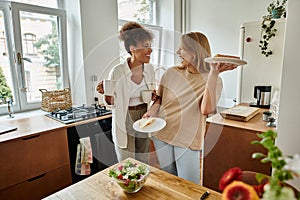 Two partners share a light-hearted photo