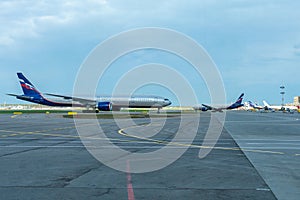 Two passenger plane preparing to take off at the runway, Sheremetyevo International Airport