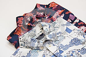 Two patterned men shirts