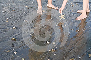 Two people on the beach photo