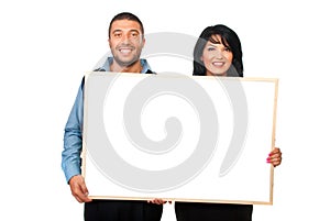 Two people with blank banner