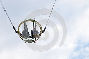 Two people on the bungee ride bottom view