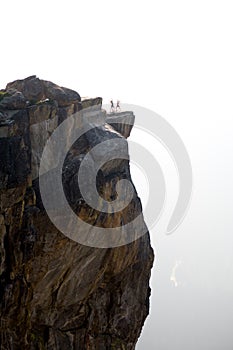 Two people on cliff side