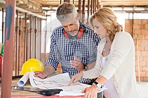 Two People Discussing Plan Project