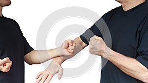 Two people are doing techniques Wing Chun