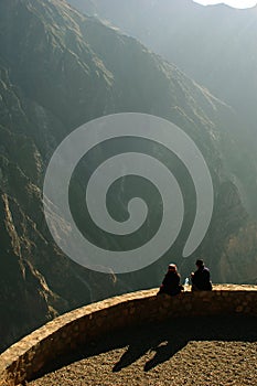 Two people on the edge of Colca Canyon photo