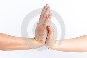 Two people high five on white background