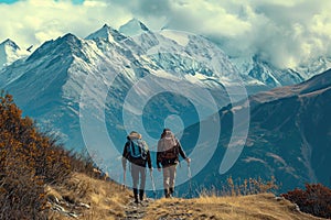 Two People Hiking up a Hill With Mountains in the Background, A rewarding mountain hiking experience featuring two friends and