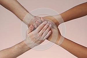 Two people joing hands