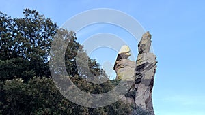 Two People Like  Ancient Rock Statues  Blue Sky Scene Nature Vegatation  Plant  Foliage Photography photo