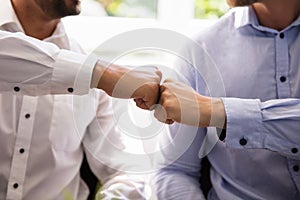 Two People Making Fist Bump