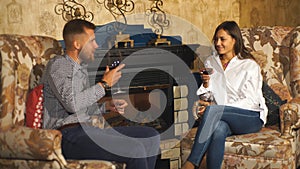 Two people, man and woman in cafe communicate, laughing and enjoying the time spending with each other