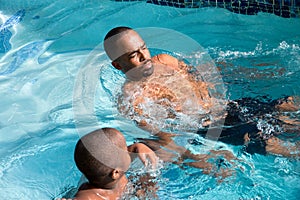 Two people swimming in cool peace