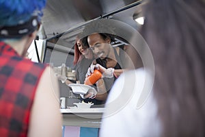 Two people works in a Food truck