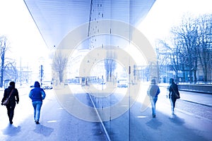 Two person moving in busy street