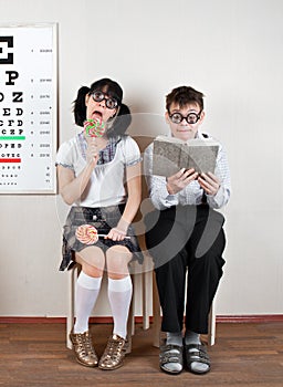 Two person wearing spectacles