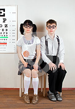 Two person wearing spectacles
