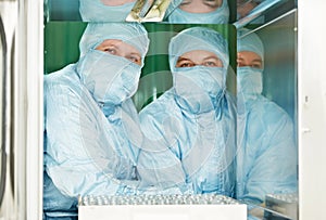 Two pharmaceutical factory workers