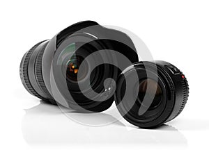 Two photo camera lenses isolated on white