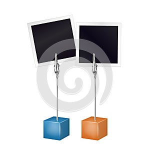 Two photo frames on a metal memo holder clip. Photos on wire silver clamps over white background. Photo album. Vector illustration photo