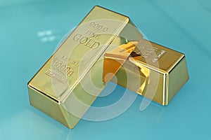 Two phycial gold bar decorte against together on the table