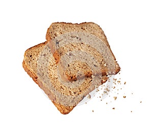 Two pieces of bread in the air with crumbs isolated on a white background