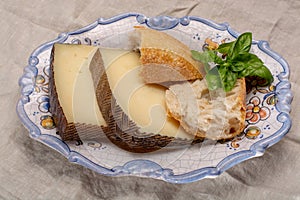 Two pieces of Manchego, queso manchego, cheese made in La Mancha photo