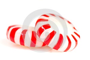 Two pieces of Peppermint Christmas candy