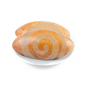 Two pies on a white plate on white background