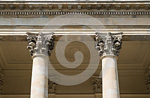 Two pillars / columns and capital on historic architecture