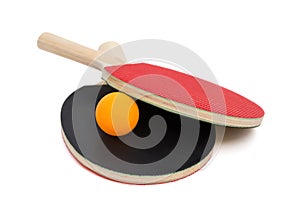 Two pingpong rackets and a ball with clipping path