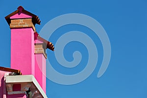 Two pink chimneys