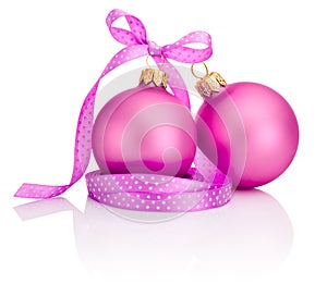 Two Pink Christmas balls with ribbon bow Isolated on white