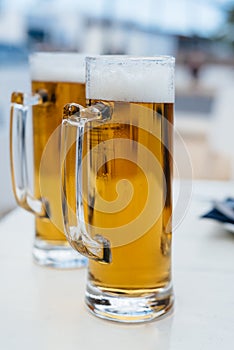 Two Pint Glasses of Cold Beer