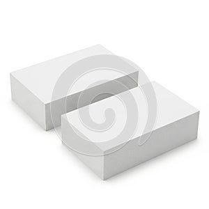 Two plain rectangular blocks positioned side by side on a neutral background