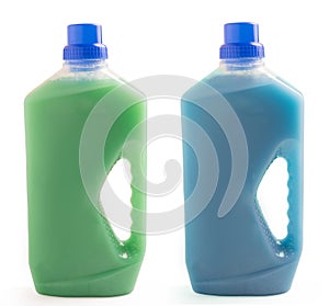 Two plastic bottles of cleaning liquid isolated on white background