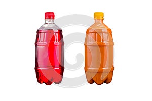 Two plastic bottles with colorful natural juices. Isolated