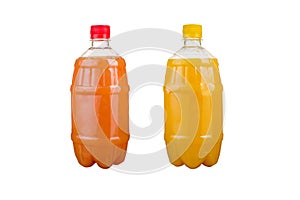 Two plastic bottles with colorful natural juices. Isolated