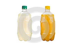 Two plastic bottles with colorful natural juices. Isolated