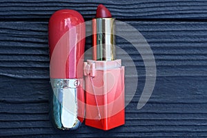 two plastic tubes of red lipstick