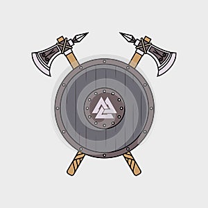 Two poleaxes and a viking shield