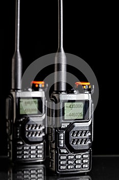 Two portable UHF radio transmitters