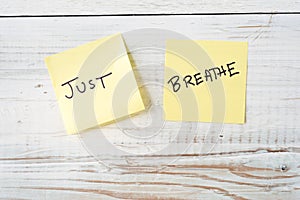 Two Post It Notes with Message Just Breathe